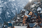 Duolingo write about the photo: Winter Serenity in a Charming Hillside Town