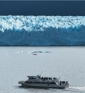 Duolingo write about the photo: A Majestic Glacier and Tour Boat Encounter