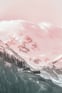 Duolingo speak about the photo: Serenity in the Snow-A Village Above the Clouds