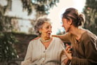 Duolingo write about the photo: A Tender Moment of Connection Outdoors