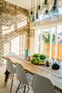 Duolingo Write About the Photo: A Dining Haven with Natural Light