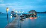 Duolingo Write About the Photo: Seaside Serenity as a Rustic Escape