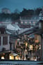 Duolingo Speak about the Photo: Twilight in a Historic Marketplace